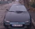 Зеленый Мазда 323, объемом двигателя 1.5 л и пробегом 185 тыс. км за 1200 $, фото 1 на Automoto.ua