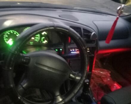 Зеленый Мазда 323, объемом двигателя 1.5 л и пробегом 185 тыс. км за 1700 $, фото 4 на Automoto.ua