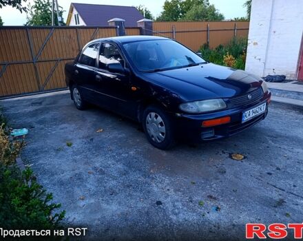 Зеленый Мазда 323, объемом двигателя 1.5 л и пробегом 235 тыс. км за 1600 $, фото 1 на Automoto.ua