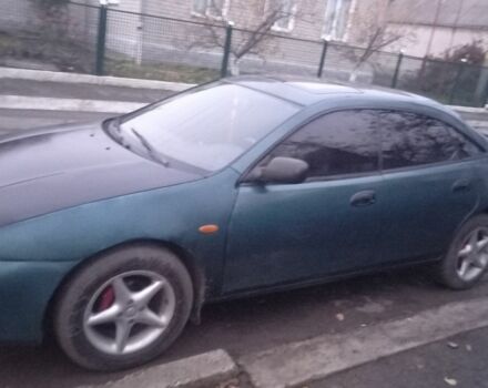 Зеленый Мазда 323, объемом двигателя 1.5 л и пробегом 185 тыс. км за 1700 $, фото 1 на Automoto.ua