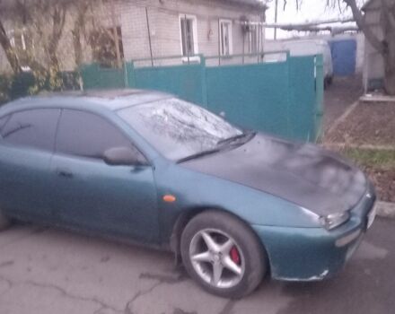 Зеленый Мазда 323, объемом двигателя 1.5 л и пробегом 185 тыс. км за 1700 $, фото 2 на Automoto.ua