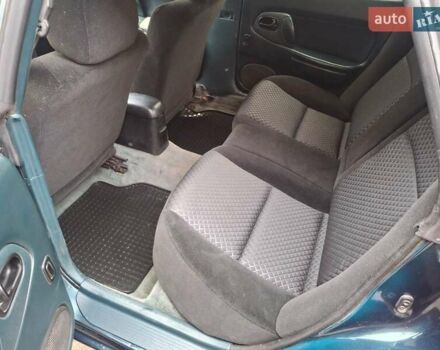Зеленый Мазда 323, объемом двигателя 1.8 л и пробегом 460 тыс. км за 2900 $, фото 4 на Automoto.ua