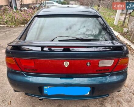Зеленый Мазда 323, объемом двигателя 1.8 л и пробегом 460 тыс. км за 2900 $, фото 10 на Automoto.ua