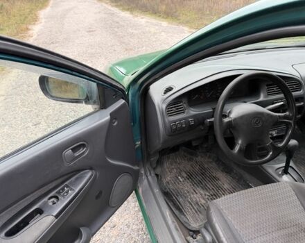Зеленый Мазда 323, объемом двигателя 1.5 л и пробегом 213 тыс. км за 2950 $, фото 8 на Automoto.ua
