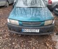 Зеленый Мазда 323, объемом двигателя 1.5 л и пробегом 200 тыс. км за 700 $, фото 1 на Automoto.ua