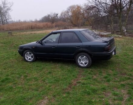 Зелений Мазда 323, об'ємом двигуна 1.6 л та пробігом 333 тис. км за 950 $, фото 1 на Automoto.ua