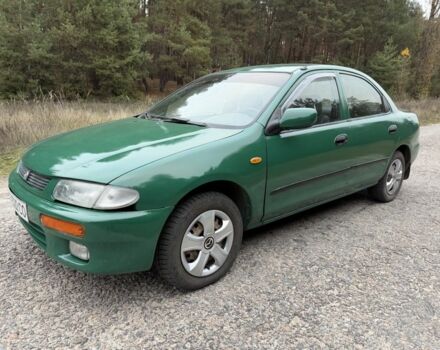Зеленый Мазда 323, объемом двигателя 1.5 л и пробегом 213 тыс. км за 2950 $, фото 1 на Automoto.ua