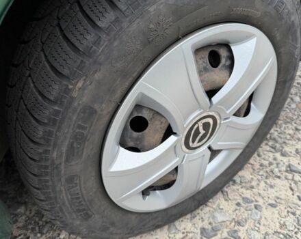 Зеленый Мазда 323, объемом двигателя 1.5 л и пробегом 213 тыс. км за 2950 $, фото 10 на Automoto.ua