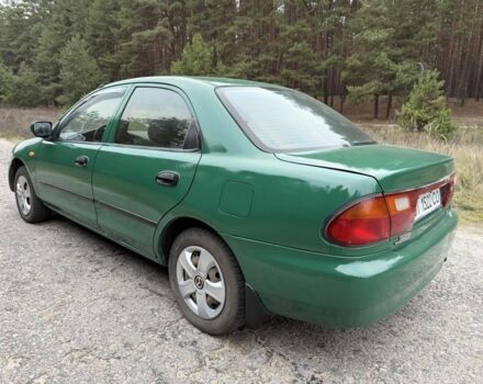 Зеленый Мазда 323, объемом двигателя 1.5 л и пробегом 213 тыс. км за 2950 $, фото 3 на Automoto.ua