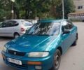 Зеленый Мазда 323, объемом двигателя 1.5 л и пробегом 356 тыс. км за 3300 $, фото 1 на Automoto.ua