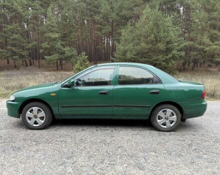 Зеленый Мазда 323, объемом двигателя 1.5 л и пробегом 213 тыс. км за 2950 $, фото 5 на Automoto.ua
