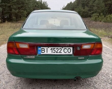 Зеленый Мазда 323, объемом двигателя 1.5 л и пробегом 213 тыс. км за 2950 $, фото 6 на Automoto.ua