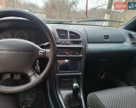 Зеленый Мазда 323, объемом двигателя 1.8 л и пробегом 460 тыс. км за 2900 $, фото 7 на Automoto.ua