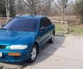 Зеленый Мазда 323, объемом двигателя 1.5 л и пробегом 350 тыс. км за 2200 $, фото 1 на Automoto.ua