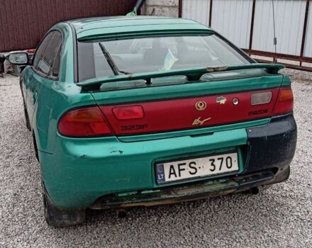 Зелений Мазда 323, об'ємом двигуна 1.5 л та пробігом 100 тис. км за 525 $, фото 3 на Automoto.ua