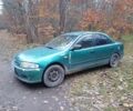 Зеленый Мазда 323, объемом двигателя 1.5 л и пробегом 308 тыс. км за 1548 $, фото 1 на Automoto.ua