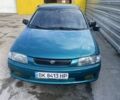 Зеленый Мазда 323, объемом двигателя 1.5 л и пробегом 348 тыс. км за 2750 $, фото 4 на Automoto.ua
