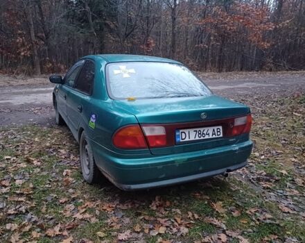Зеленый Мазда 323, объемом двигателя 1.5 л и пробегом 308 тыс. км за 1548 $, фото 2 на Automoto.ua