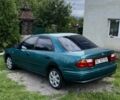 Зелений Мазда 323, об'ємом двигуна 0 л та пробігом 194 тис. км за 1000 $, фото 1 на Automoto.ua