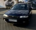 Зеленый Мазда 323, объемом двигателя 1.5 л и пробегом 335 тыс. км за 1850 $, фото 1 на Automoto.ua
