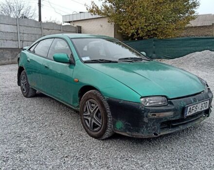 Зелений Мазда 323, об'ємом двигуна 1.5 л та пробігом 100 тис. км за 525 $, фото 1 на Automoto.ua