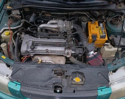 Зеленый Мазда 323, объемом двигателя 1.5 л и пробегом 308 тыс. км за 1548 $, фото 4 на Automoto.ua