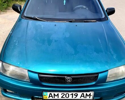 Зеленый Мазда 323, объемом двигателя 1.5 л и пробегом 254 тыс. км за 1800 $, фото 11 на Automoto.ua