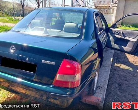 Зеленый Мазда 323, объемом двигателя 15 л и пробегом 0 тыс. км за 1700 $, фото 4 на Automoto.ua