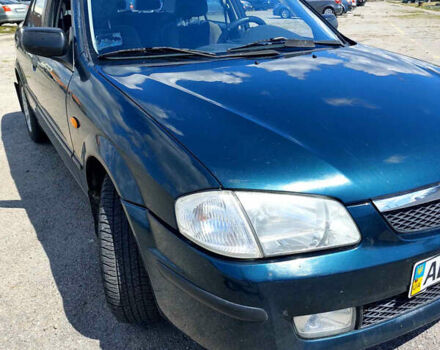 Зелений Мазда 323, об'ємом двигуна 1.5 л та пробігом 144 тис. км за 2600 $, фото 2 на Automoto.ua