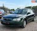 Зеленый Мазда 323, объемом двигателя 1.5 л и пробегом 248 тыс. км за 1700 $, фото 1 на Automoto.ua