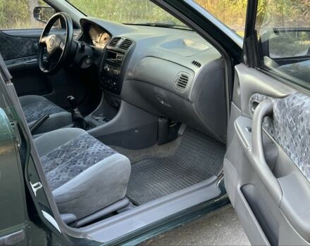 Зелений Мазда 323, об'ємом двигуна 1.8 л та пробігом 4 тис. км за 1900 $, фото 6 на Automoto.ua