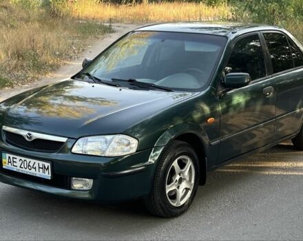 Зелений Мазда 323, об'ємом двигуна 1.8 л та пробігом 4 тис. км за 1900 $, фото 1 на Automoto.ua