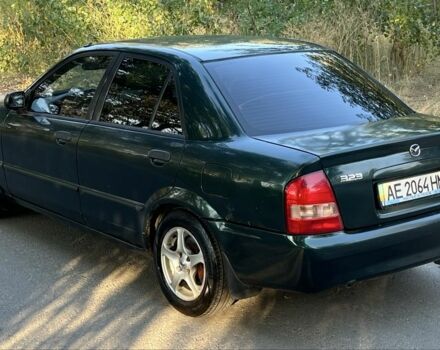 Зелений Мазда 323, об'ємом двигуна 1.8 л та пробігом 4 тис. км за 1900 $, фото 4 на Automoto.ua