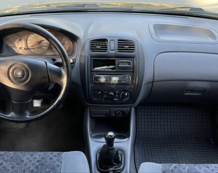 Зелений Мазда 323, об'ємом двигуна 1.8 л та пробігом 4 тис. км за 1900 $, фото 10 на Automoto.ua