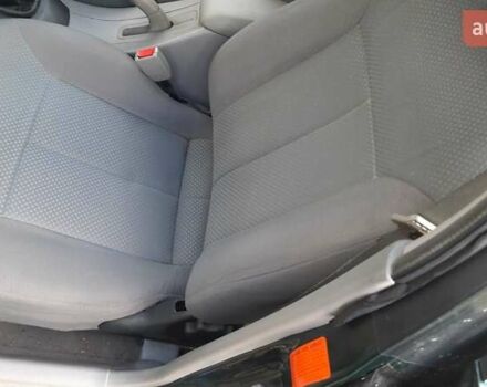 Зелений Мазда 323, об'ємом двигуна 1.3 л та пробігом 167 тис. км за 3473 $, фото 6 на Automoto.ua