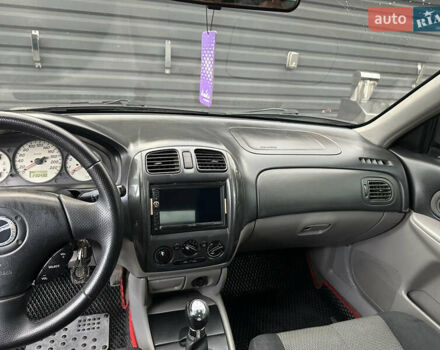 Зеленый Мазда 323, объемом двигателя 1.6 л и пробегом 230 тыс. км за 3000 $, фото 10 на Automoto.ua