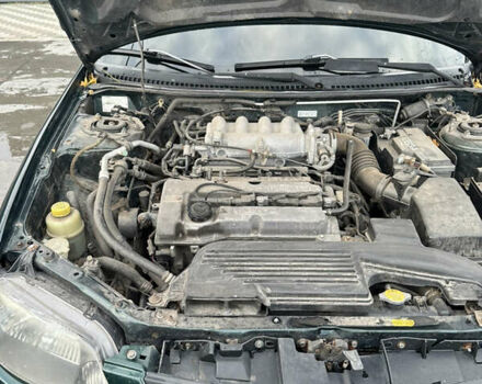 Зеленый Мазда 323, объемом двигателя 1.6 л и пробегом 230 тыс. км за 3000 $, фото 4 на Automoto.ua