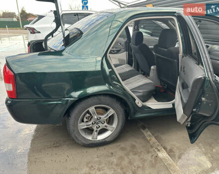 Зеленый Мазда 323, объемом двигателя 1.6 л и пробегом 230 тыс. км за 3000 $, фото 14 на Automoto.ua