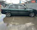 Зеленый Мазда 323, объемом двигателя 1.6 л и пробегом 230 тыс. км за 3000 $, фото 2 на Automoto.ua