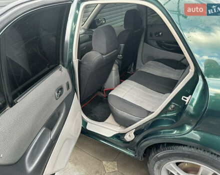 Зеленый Мазда 323, объемом двигателя 1.6 л и пробегом 230 тыс. км за 3000 $, фото 12 на Automoto.ua