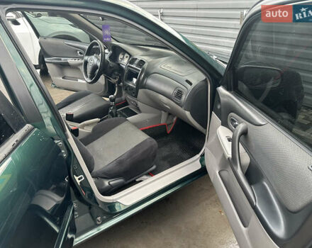 Зеленый Мазда 323, объемом двигателя 1.6 л и пробегом 230 тыс. км за 3000 $, фото 8 на Automoto.ua