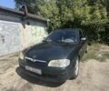 Зеленый Мазда 323, объемом двигателя 1.8 л и пробегом 320 тыс. км за 1004 $, фото 1 на Automoto.ua