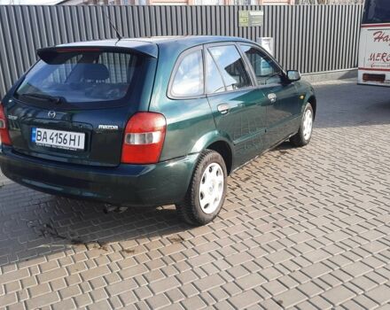 Зелений Мазда 323, об'ємом двигуна 1.3 л та пробігом 167 тис. км за 3473 $, фото 4 на Automoto.ua