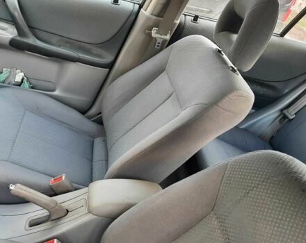 Зелений Мазда 323, об'ємом двигуна 1.3 л та пробігом 167 тис. км за 3473 $, фото 8 на Automoto.ua