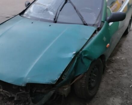 Зеленый Мазда 323, объемом двигателя 0 л и пробегом 323 тыс. км за 700 $, фото 3 на Automoto.ua