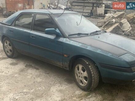 Мазда 323 1993 в Киеве на Automoto.ua Зеленый Мазда 323, объемом двигателя 1.6 л и пробегом 333 тыс. км за 1752 $, фото 1 на Automoto.ua