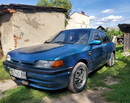 Зеленый Мазда 323, объемом двигателя 0 л и пробегом 320 тыс. км за 1035 $, фото 1 на Automoto.ua