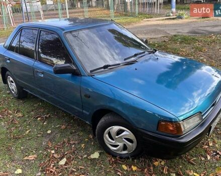 Зеленый Мазда 323, объемом двигателя 1.6 л и пробегом 200 тыс. км за 1000 $, фото 1 на Automoto.ua