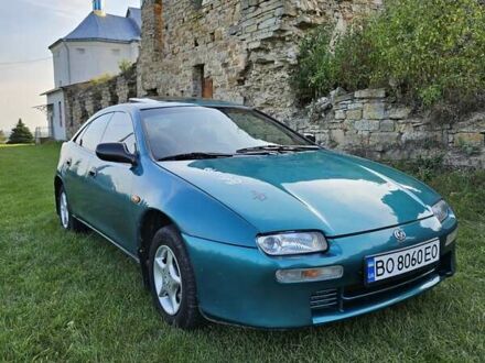 Зеленый Мазда 323, объемом двигателя 1.49 л и пробегом 359 тыс. км за 3199 $, фото 1 на Automoto.ua