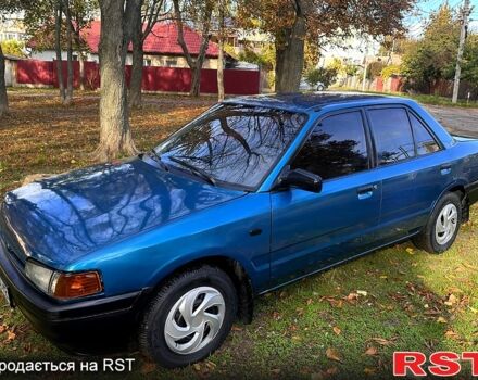 Зеленый Мазда 323, объемом двигателя 1.3 л и пробегом 200 тыс. км за 1250 $, фото 1 на Automoto.ua